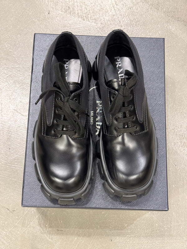 2023 Prada monolith leather/Nylon derby shoes