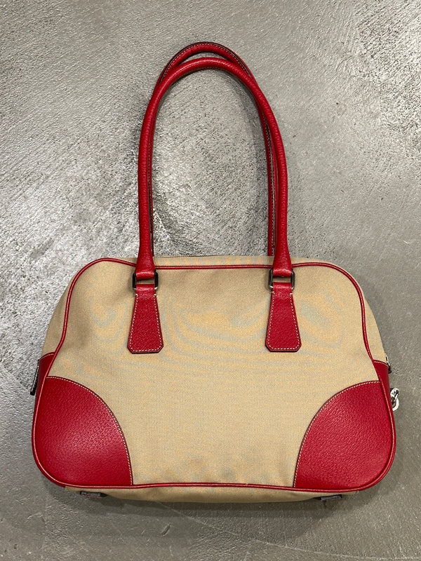 2000s Prada jacquard bowler bag with red leather trim