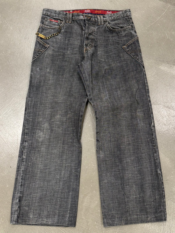 2003 Dolce & Gabbana asymmetrical heavy faded jeans