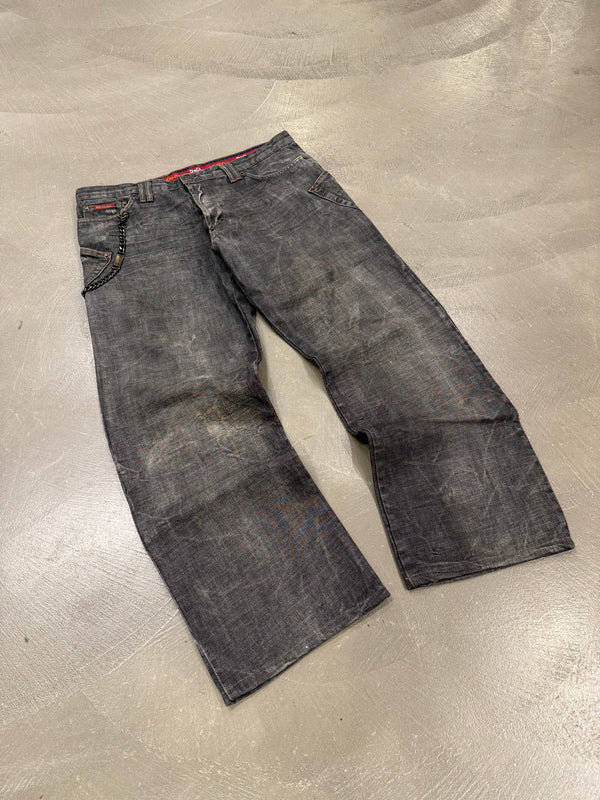 2003 Dolce & Gabbana asymmetrical heavy denim with chain