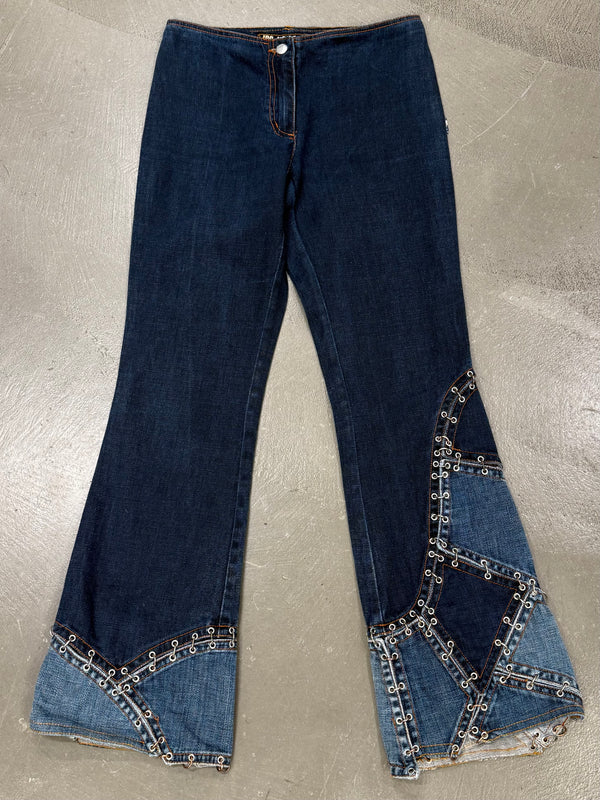 2000s Jean Paul Gaultier pierced patchwork flared jeans