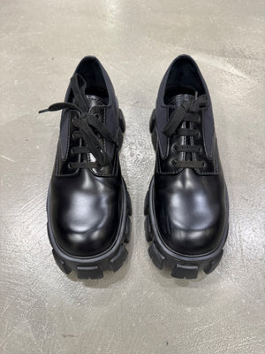 2023 Prada monolith leather/Nylon derby shoes