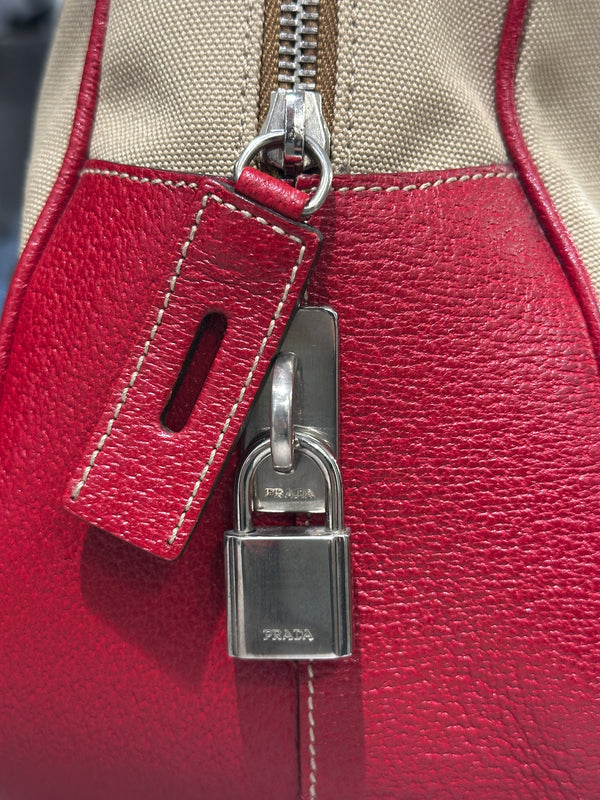 2000s Prada jacquard bowler bag with red leather trim