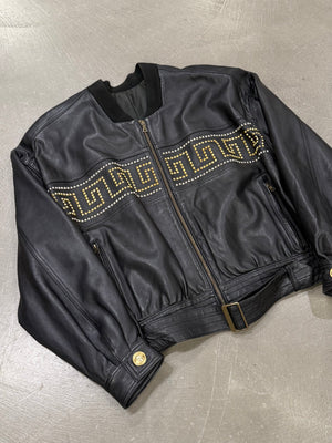 1990s Gianni Versace leather jacket with gold studs details