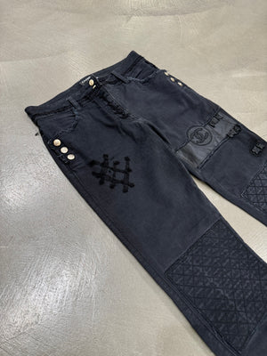 2000s Chanel black distressed patchwork jeans