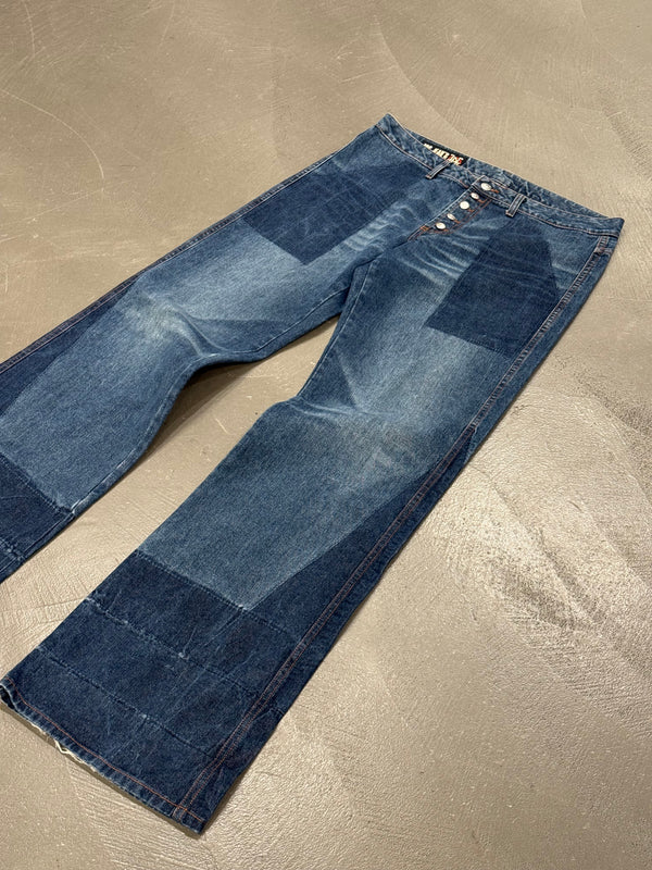 2000s Jean Paul Gaultier flared patchwork jeans