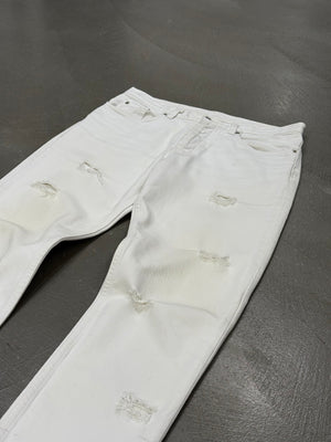 2000s Helmut Lang distressed white jeans
