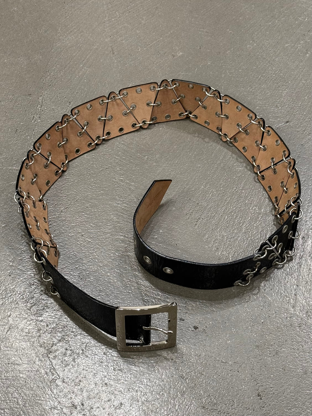 2000s Dolce & Gabbana pierced belts