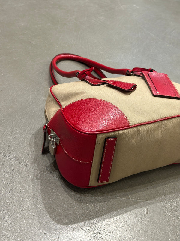 2000s Prada jacquard bowler bag with red leather trim