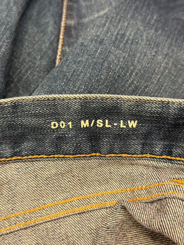 2013 Saint Laurent by Hedi Slimane mid-wash denim pants