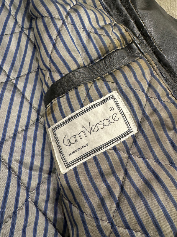 1980s Gianni Versace bondage leather bomber jacket