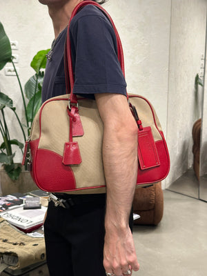 2000s Prada jacquard bowler bag with red leather trim